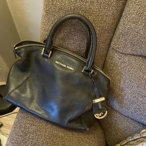 Small black Michael Kors bag for sale/ Used and still in good condition $63